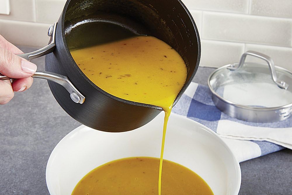  Calphalon Premier Space-Saving 2.5-Qt Saucepan with Lid in action — our testing setup